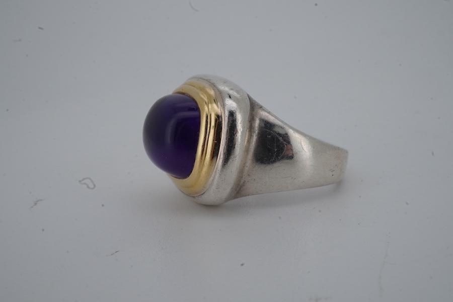 Paloma Picasso for Tiffany & Co., an amethyst ring, set with a sugarloaf cabochon amethyst, collet-set in bicoloured silver, size L, signed Tiffany & Co. and Paloma Picasso, British hallmarks for silver, pouch stamped Ti